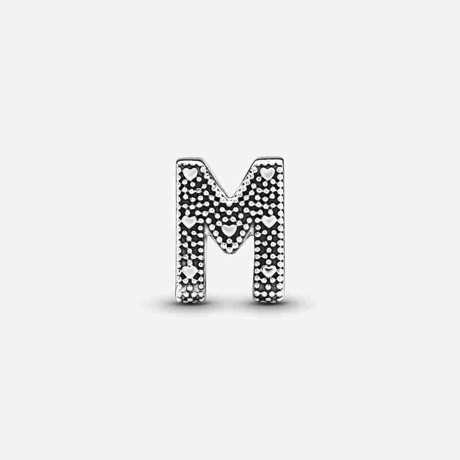 Písmeno M_1